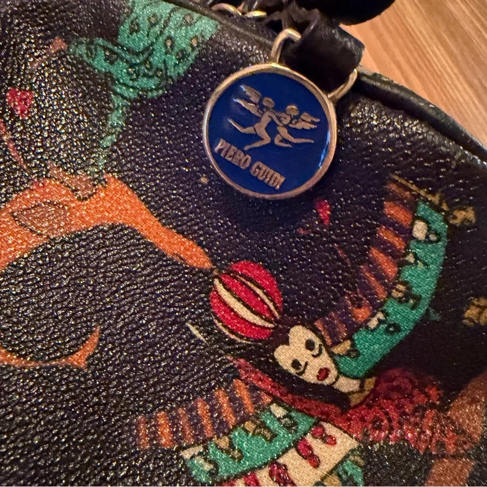 Piero Guidi Magic Circus print crossbody bag embossed fabric with leather trim
